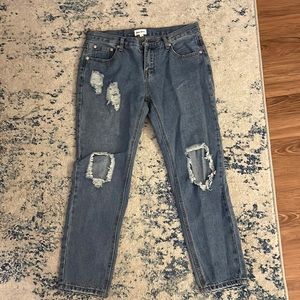 Light blue ripped jeans